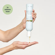 milk-shake-normalizing-blend-shampoo-in-hand-2